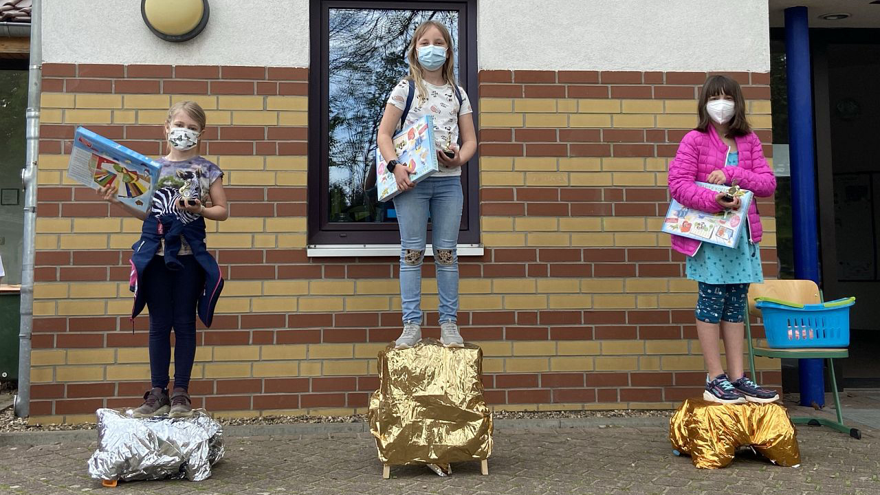 Gold, Silber, Bronze: Kinder auf dem Siegertreppchen